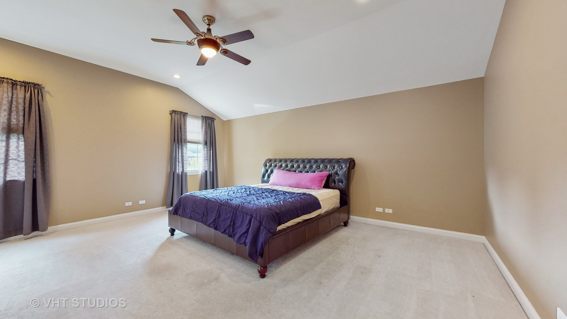305 Saddle Lane Fox River Grove, IL 60021 - Photo 28 of 55 a spacious bedroom with a bed and a ceiling fan