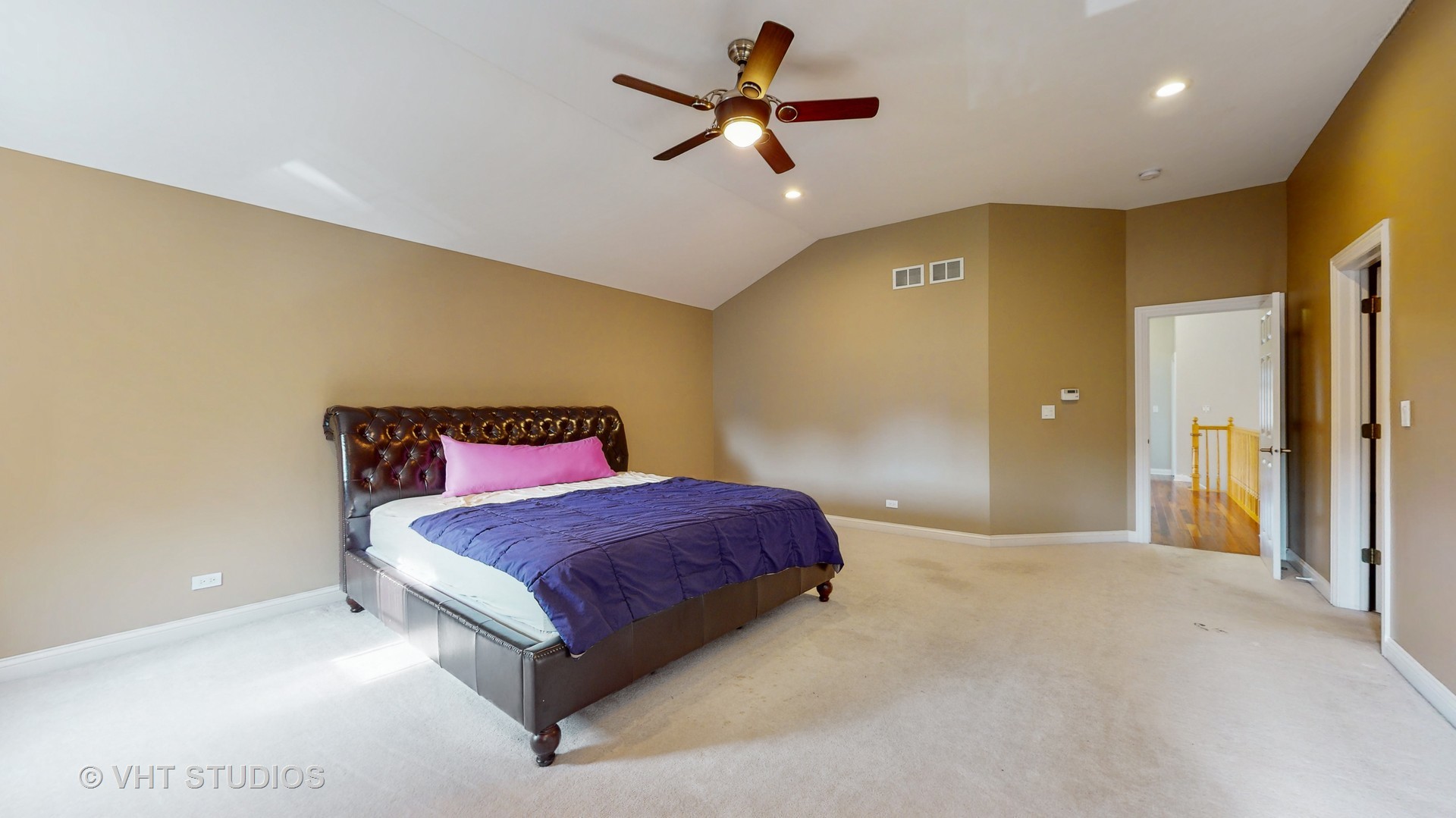 305 Saddle Lane Fox River Grove, IL 60021 - Photo 29 of 55 a spacious bedroom with a bed and a ceiling fan