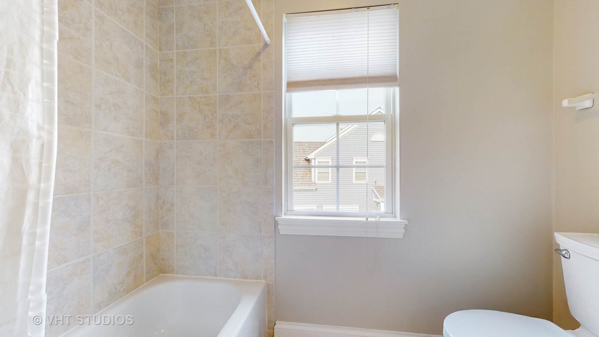 305 Saddle Lane Fox River Grove, IL 60021 - Photo 40 of 55 a bathroom with a toilet and window