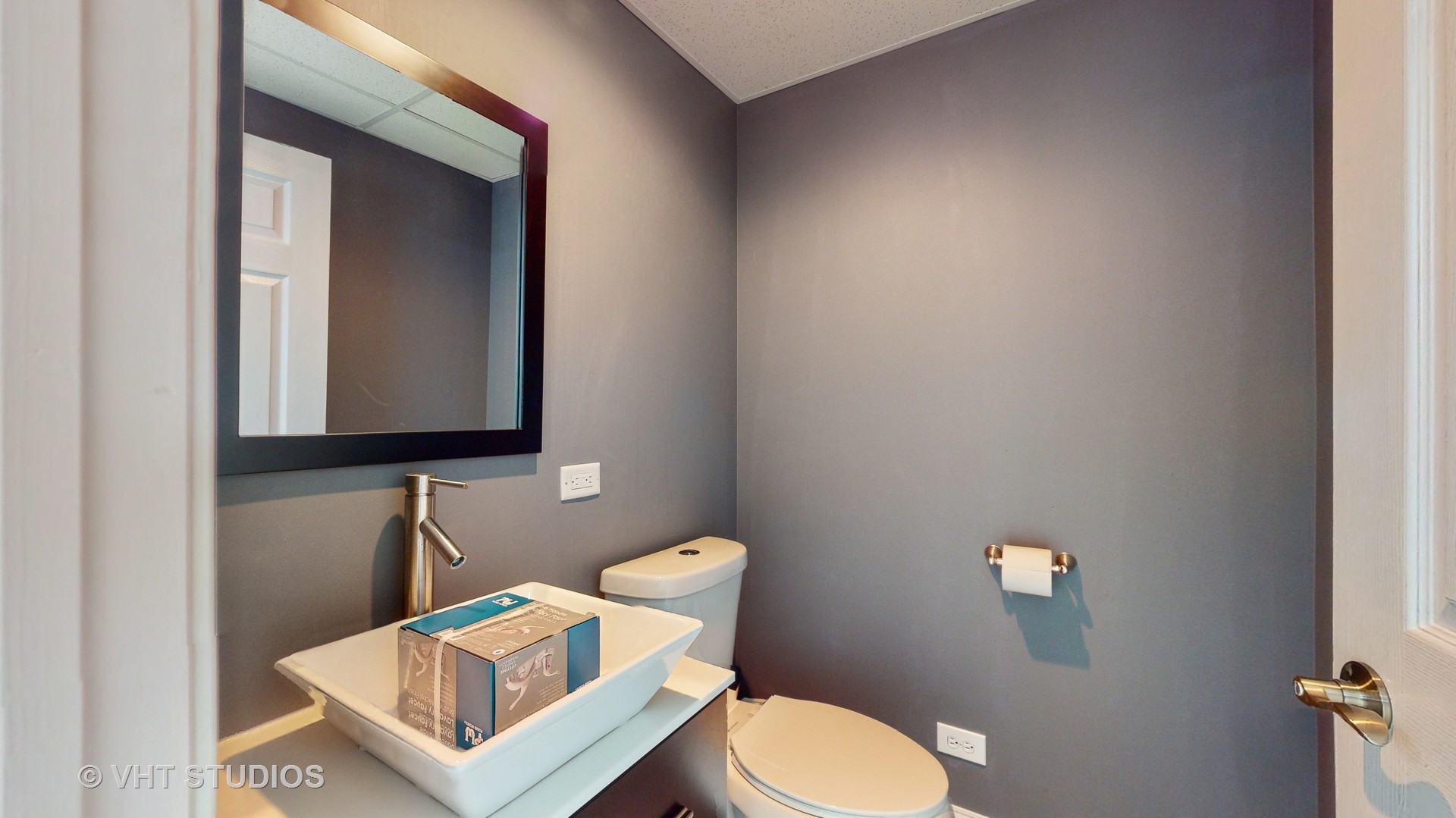 305 Saddle Lane Fox River Grove, IL 60021 - Photo 49 of 55 a bathroom with a toilet sink and mirror