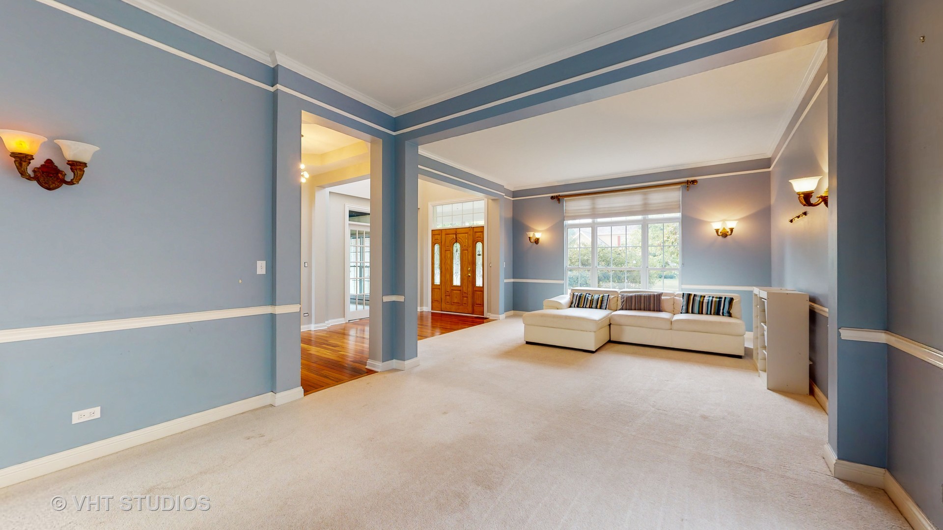 305 Saddle Lane Fox River Grove, IL 60021 - Photo 8 of 55 a living room with furniture and a large window