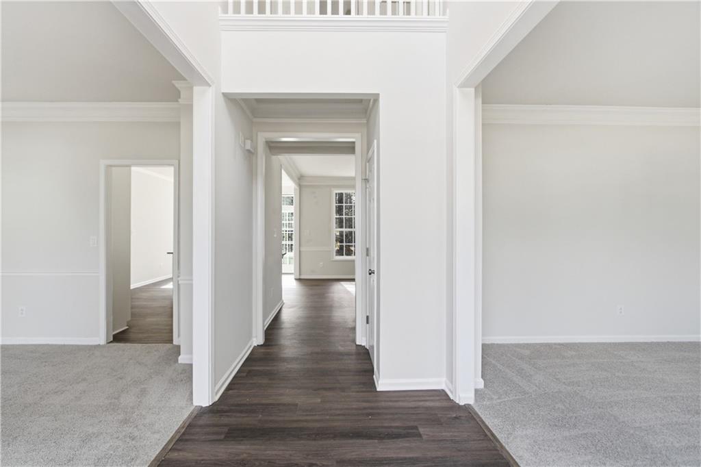 2296 Talbot Ridge Jonesboro, GA 30236 - Photo 15 of 44 a view of a hallway with the wooden floor