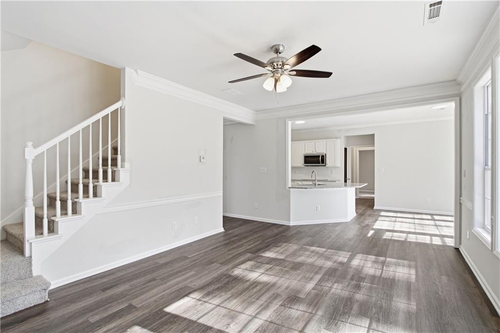2296 Talbot Ridge Jonesboro, GA 30236 - Photo 16 of 44 a view of an empty room with wooden floor and a window