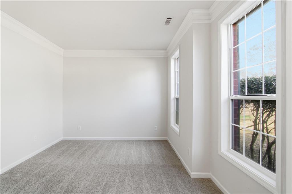 2296 Talbot Ridge Jonesboro, GA 30236 - Photo 22 of 44 a view of a small space with wooden floor and a window