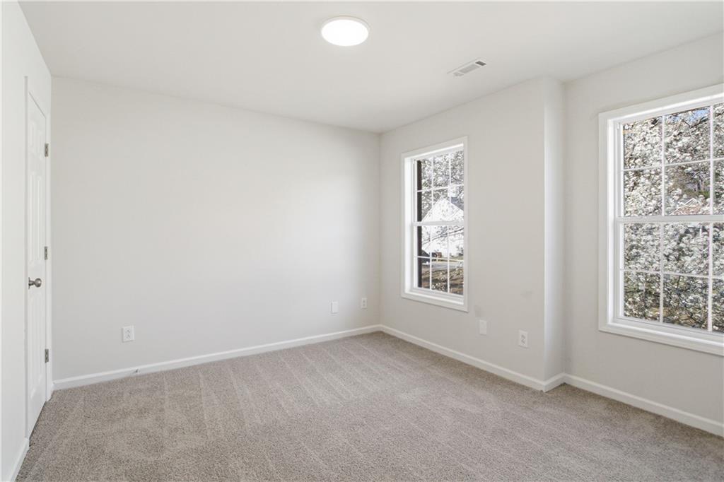 2296 Talbot Ridge Jonesboro, GA 30236 - Photo 26 of 44 an empty room with windows