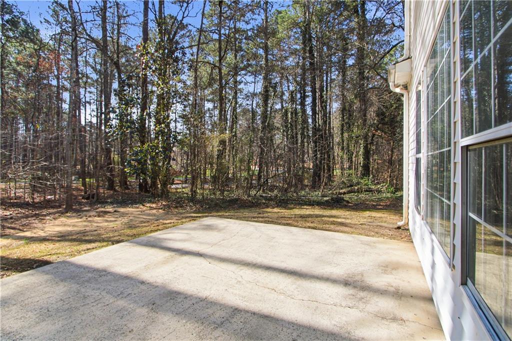 2296 Talbot Ridge Jonesboro, GA 30236 - Photo 39 of 44 a view of a backyard with large trees