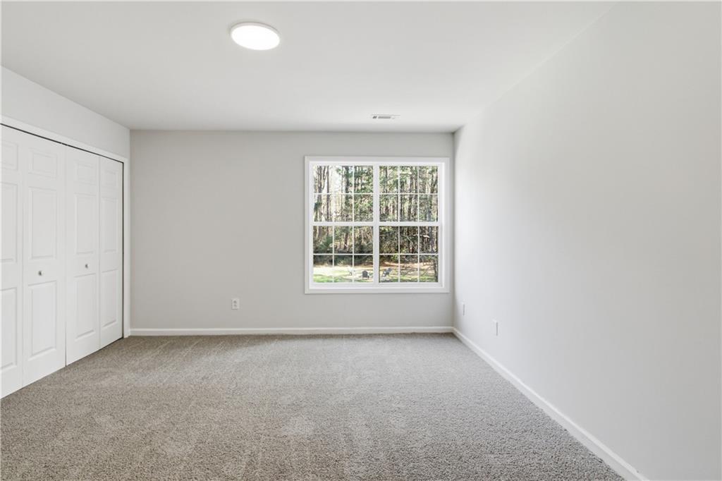 2296 Talbot Ridge Jonesboro, GA 30236 - Photo 4 of 44 an empty room with a window