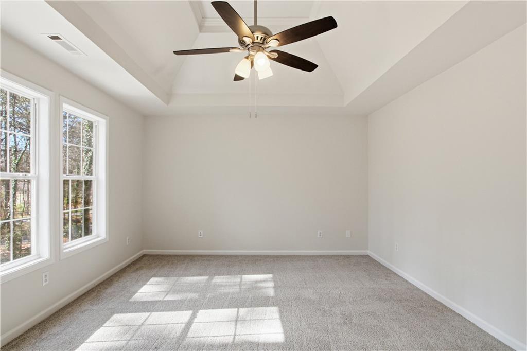 2296 Talbot Ridge Jonesboro, GA 30236 - Photo 7 of 44 an empty room with a window and a fan