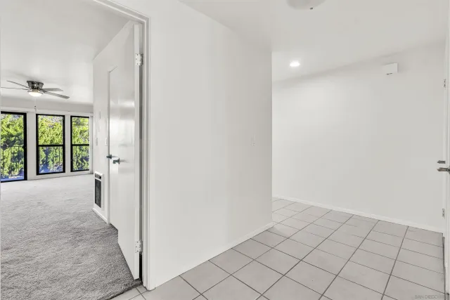 a view of an empty room and window