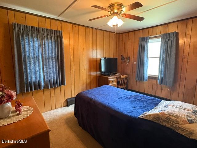 148 Friend Street Adams, MA 01220 - Photo 13 of 28 a bedroom with a bed and wooden floor