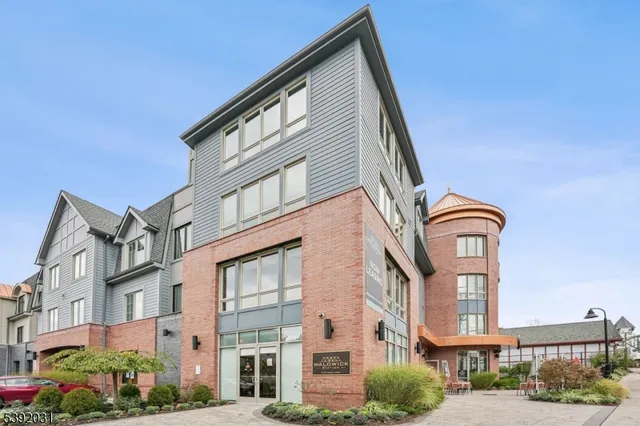 a front view of a multi story residential apartment building