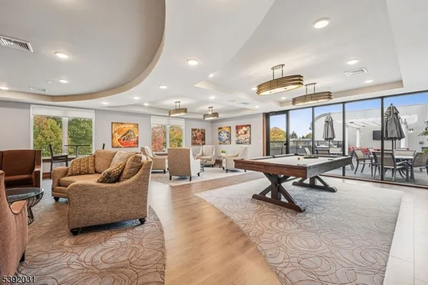 a living room with furniture and a table