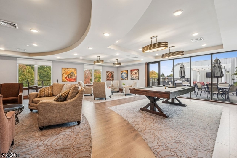 41 West Prospect Street Waldwick, NJ 07463 - Photo 13 of 19 a living room with furniture and a table