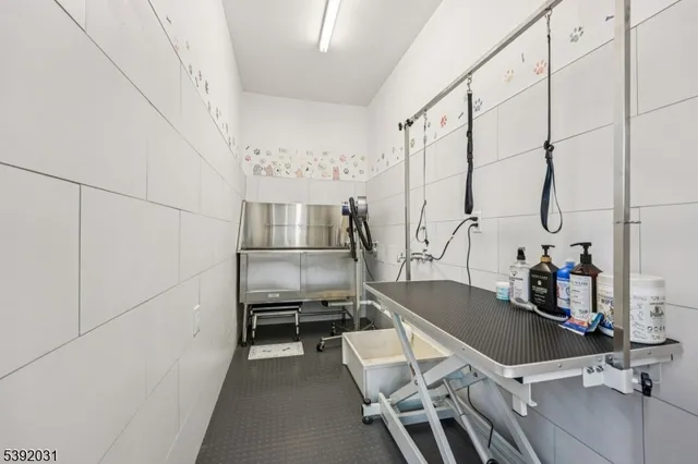 a room with chairs and stairs