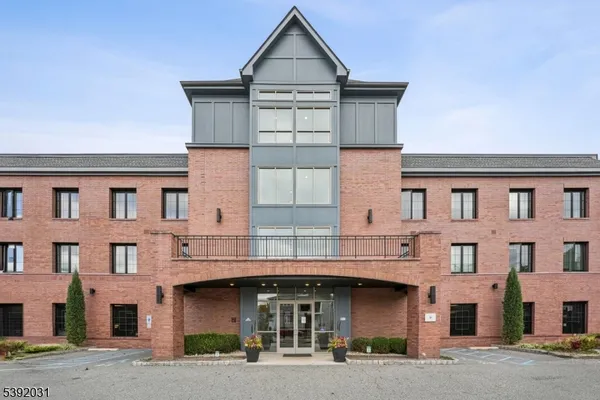 a view of a building with a street
