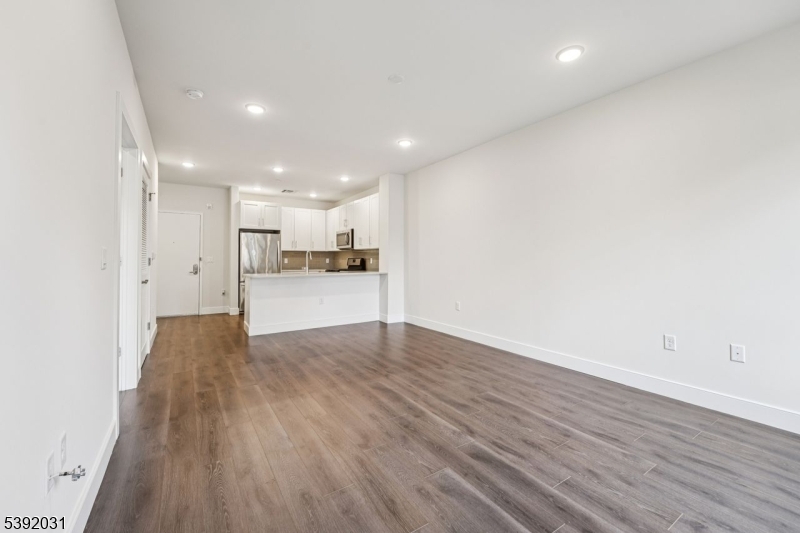 41 West Prospect Street Waldwick, NJ 07463 - Photo 5 of 19 a view of a kitchen with wooden floor