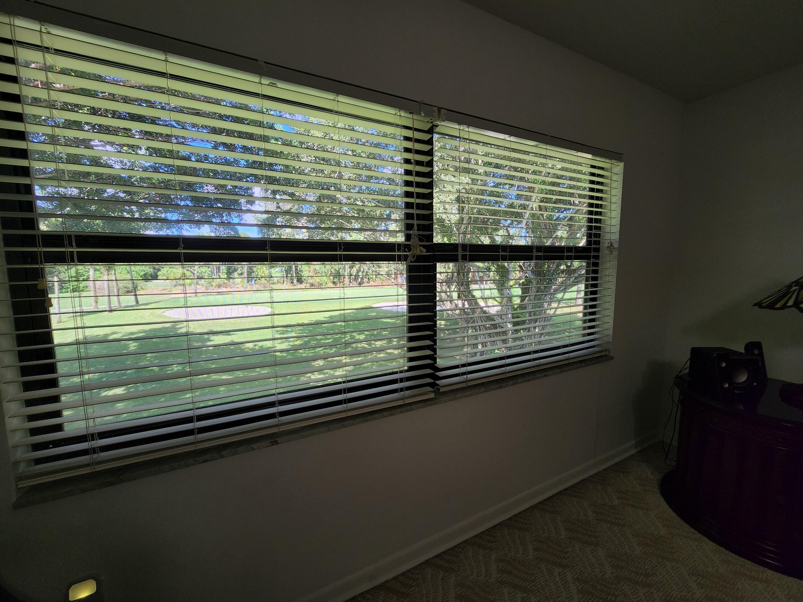 21506 Juego Circle, Unit 28H Boca Raton, FL 33433 - Photo 13 of 21 a view of a room with a large window