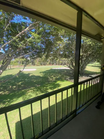 a view of a large window with an outdoor space