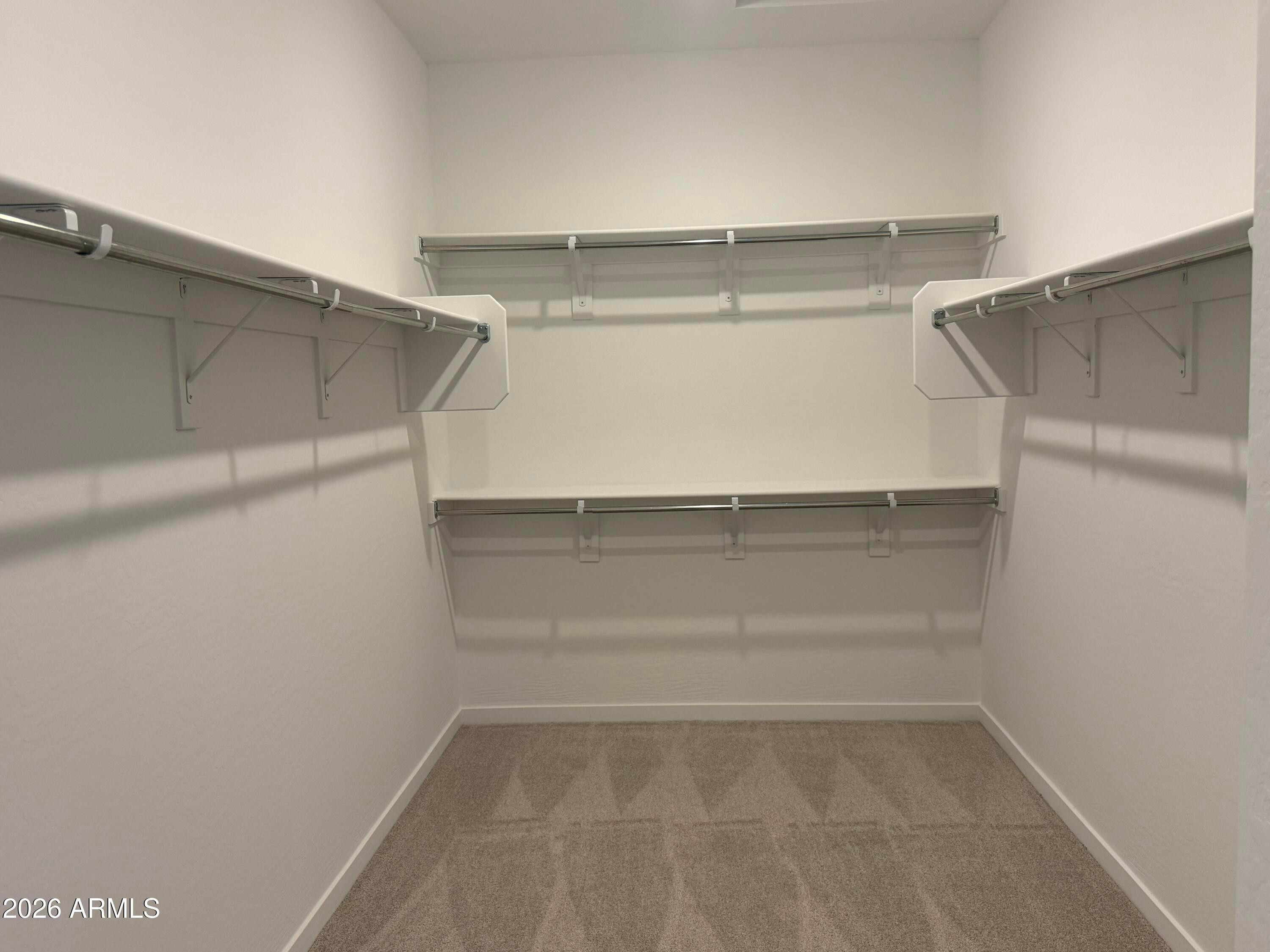 2478 Grenache Road San Tan Valley, AZ 85143 - Photo 11 of 34 a view of a room with shelf