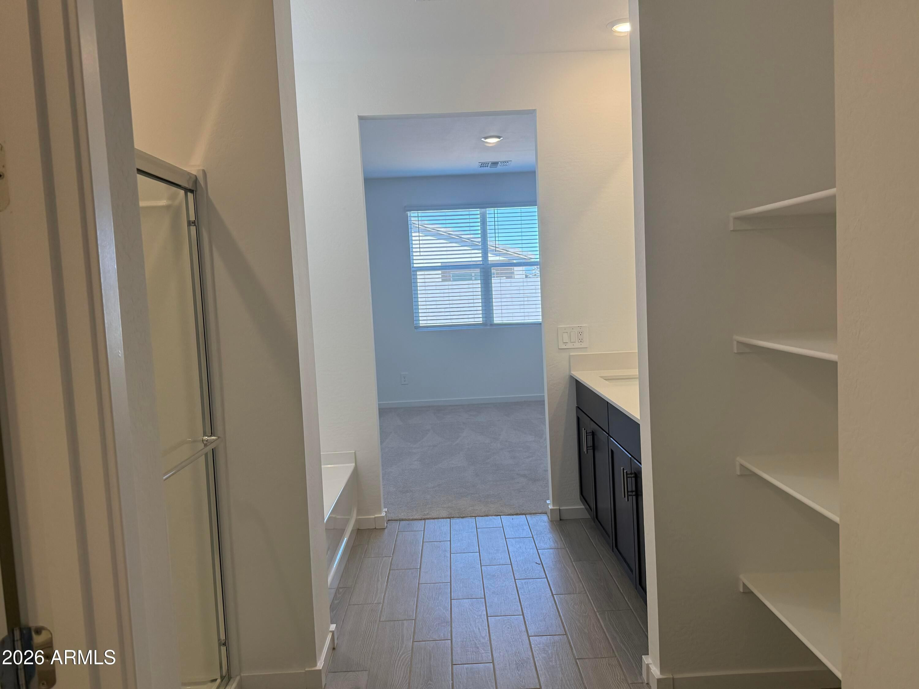 2478 Grenache Road San Tan Valley, AZ 85143 - Photo 12 of 34 a view of hallway with wooden floor