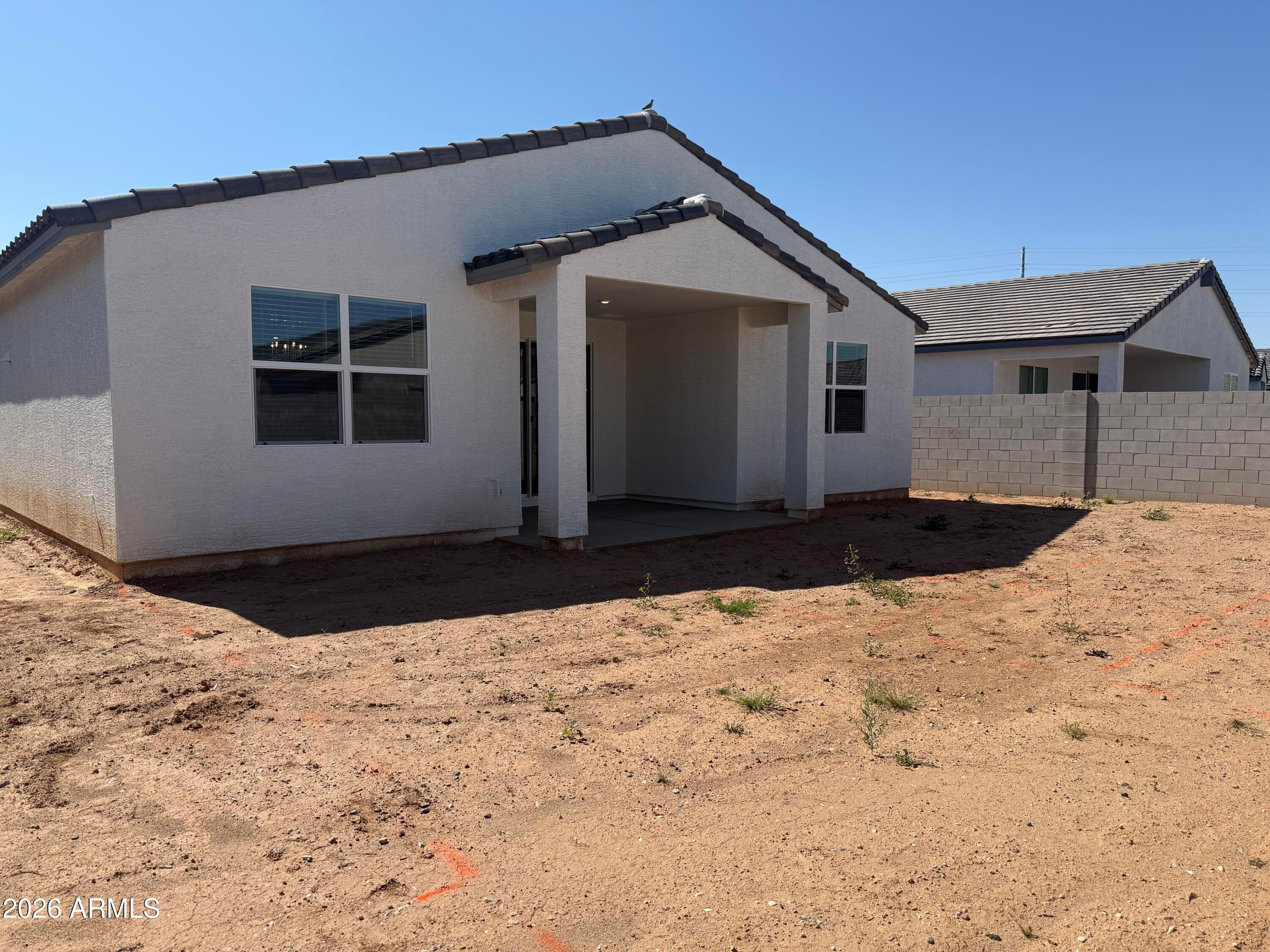 2478 Grenache Road San Tan Valley, AZ 85143 - Photo 21 of 34 a front view of a house with a yard