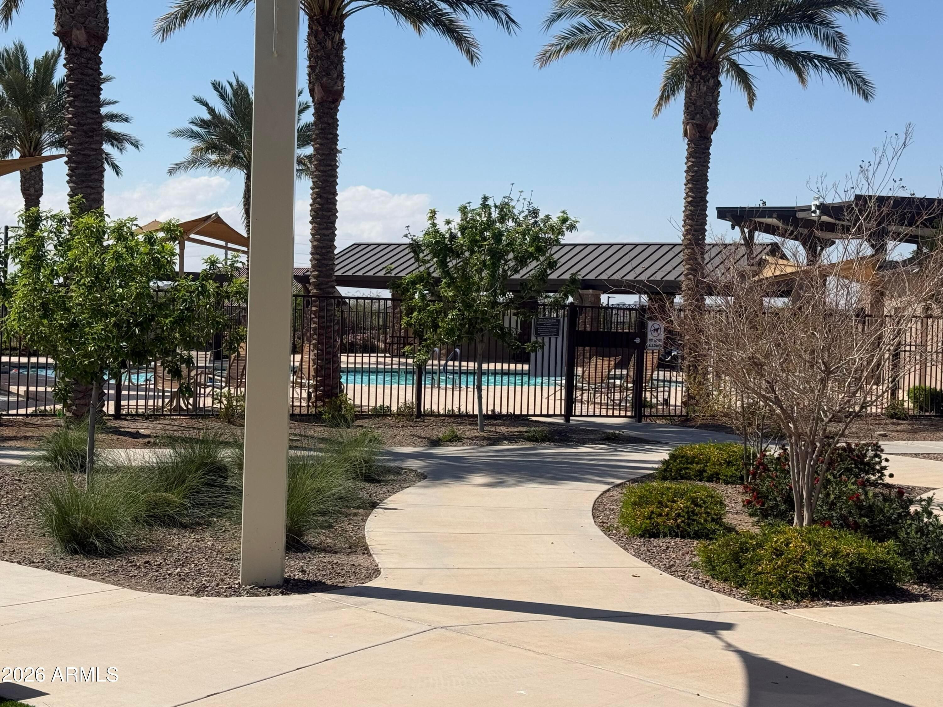 2478 Grenache Road San Tan Valley, AZ 85143 - Photo 24 of 34 a front view of multiple houses with yard