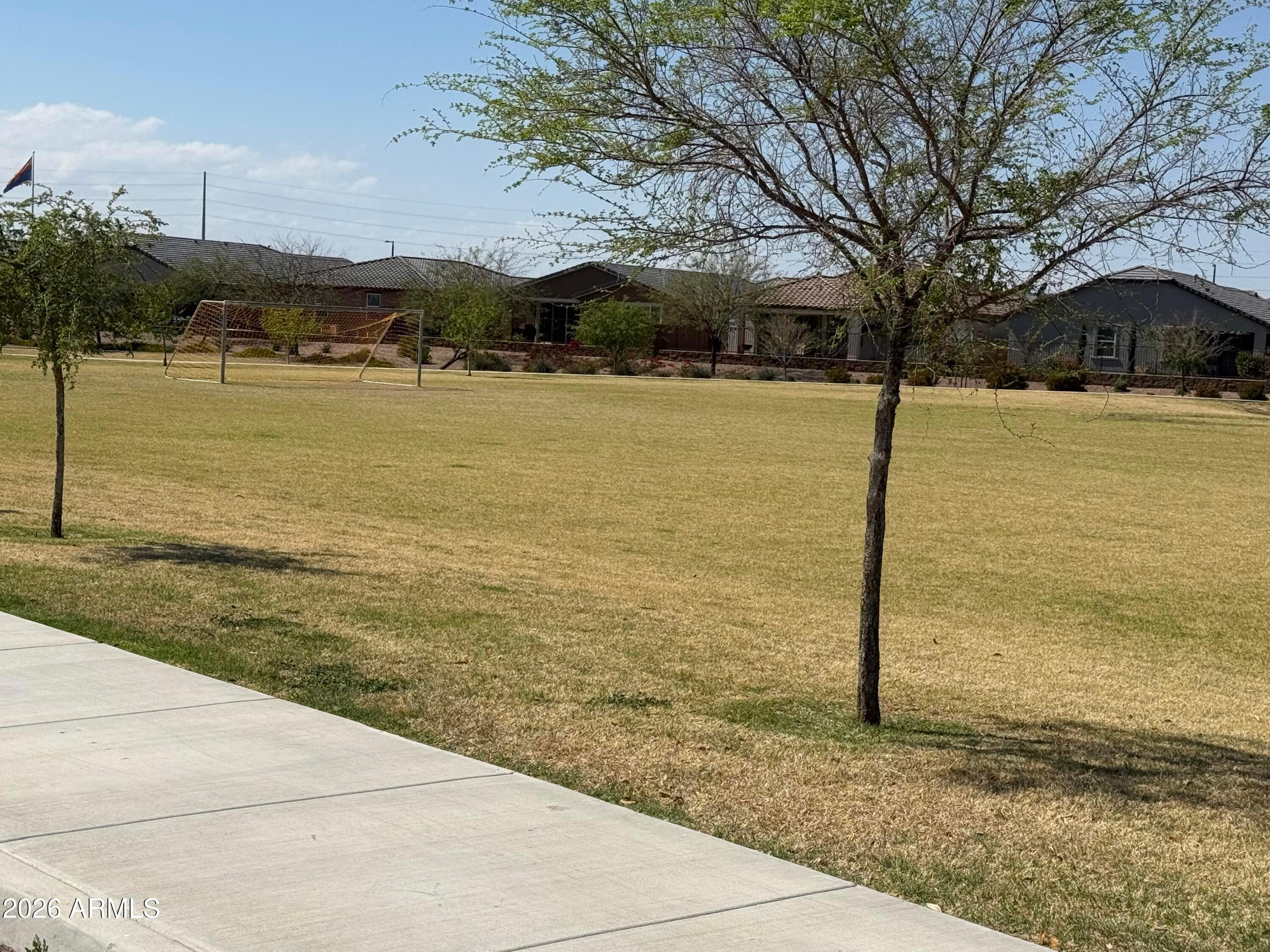 2478 Grenache Road San Tan Valley, AZ 85143 - Photo 29 of 34 a street view with residential space