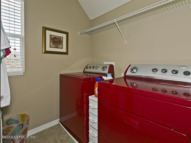 216 Michelangelo Place St. Augustine, FL 32084 - Photo 14 of 18 a view of storage and utility room with washer and dryer