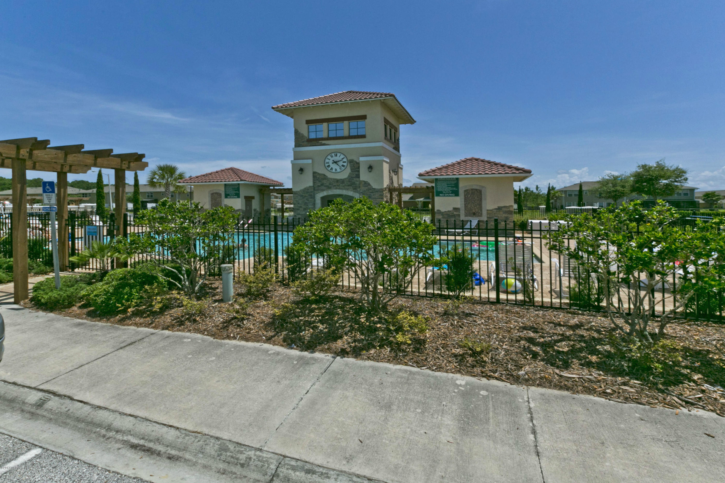 216 Michelangelo Place St. Augustine, FL 32084 - Photo 17 of 18 a front view of a house with a yard