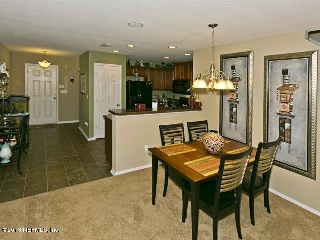 216 Michelangelo Place St. Augustine, FL 32084 - Photo 6 of 18 a view of a dining room with furniture