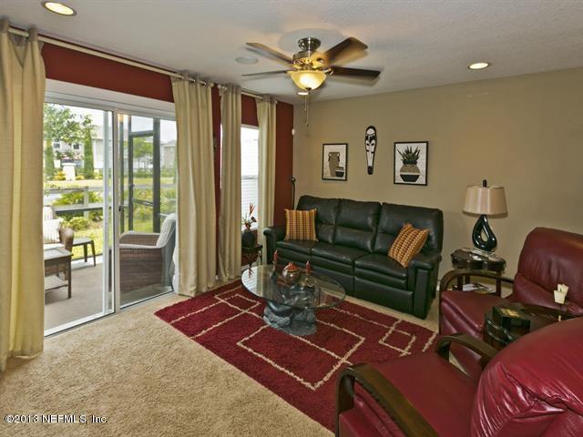 216 Michelangelo Place St. Augustine, FL 32084 - Photo 8 of 18 a living room with furniture and a large window
