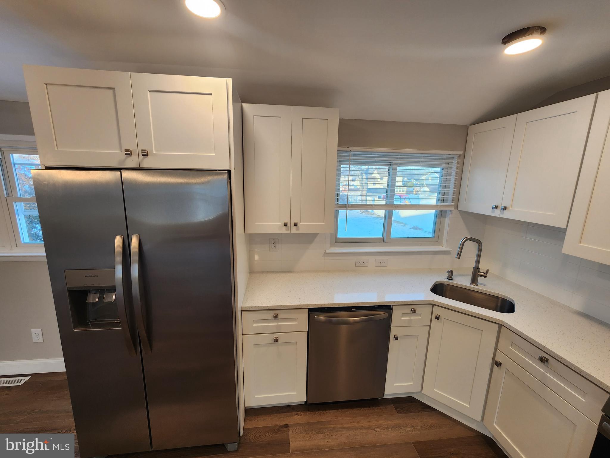 9 Bancroft Road Marlton, NJ 08053 - Photo 5 of 27 a kitchen with stainless steel appliances a refrigerator sink and cabinets