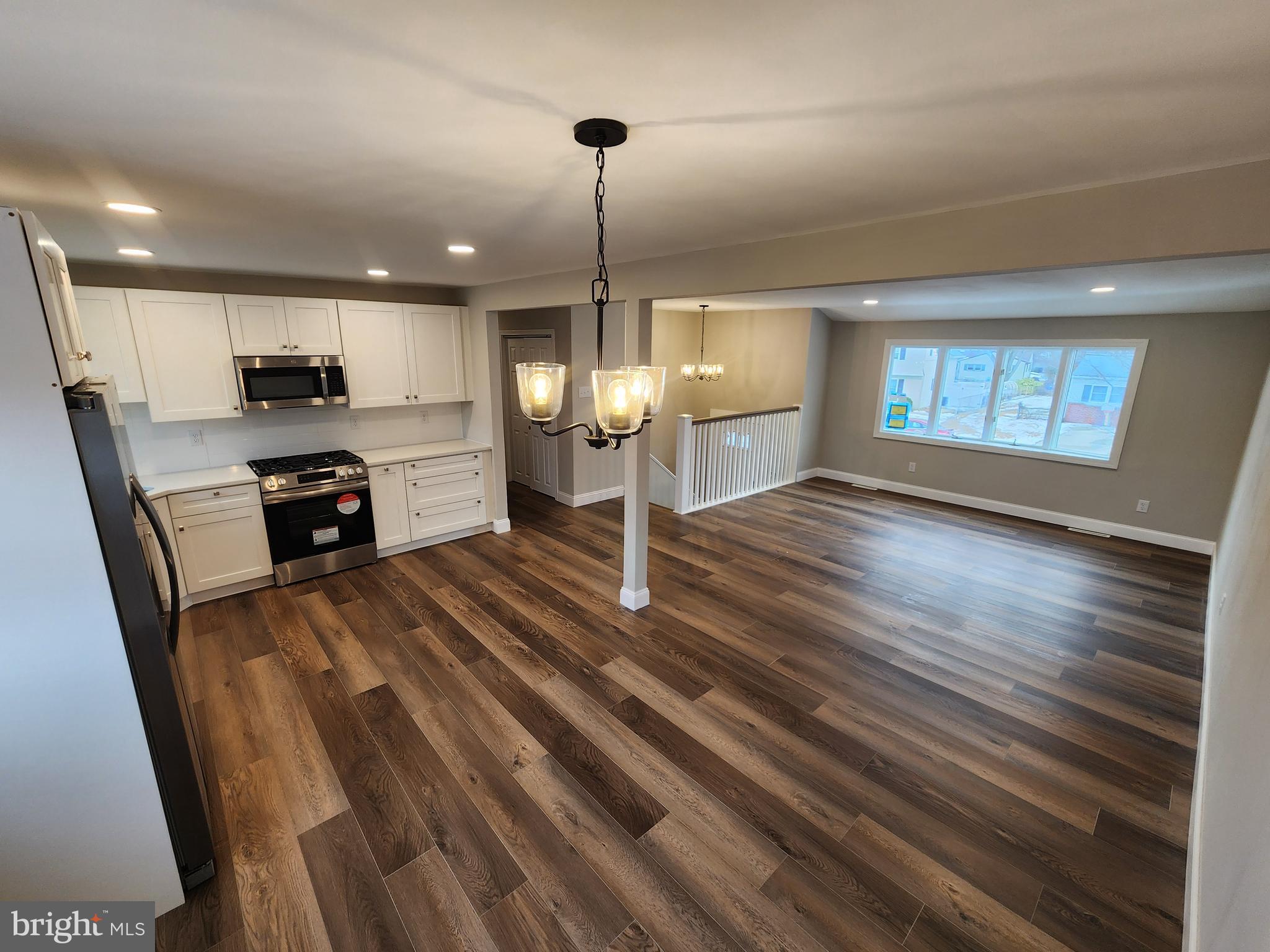 9 Bancroft Road Marlton, NJ 08053 - Photo 10 of 27 a view of kitchen with sink microwave and refrigerator
