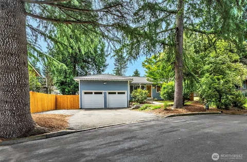 a house with trees in front of it