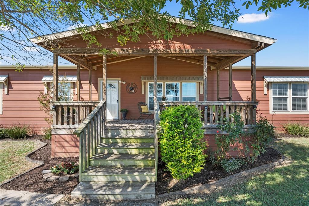 3449 Bluhm Road West, TX 76691 - Photo 3 of 40 View of front of home featuring a porch