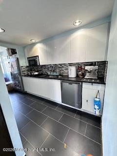 26 Windham Loop, Unit 3A Staten Island, NY 10314 - Photo 3 of 19 a kitchen with stainless steel appliances granite countertop a sink and stove top oven