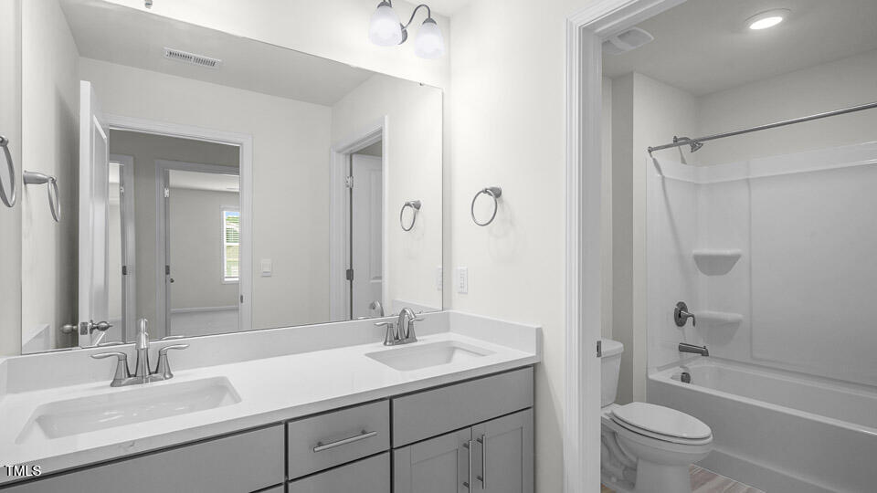 7561 Percussion Drive Apex, NC 27539 - Photo 27 of 38 Bathroom