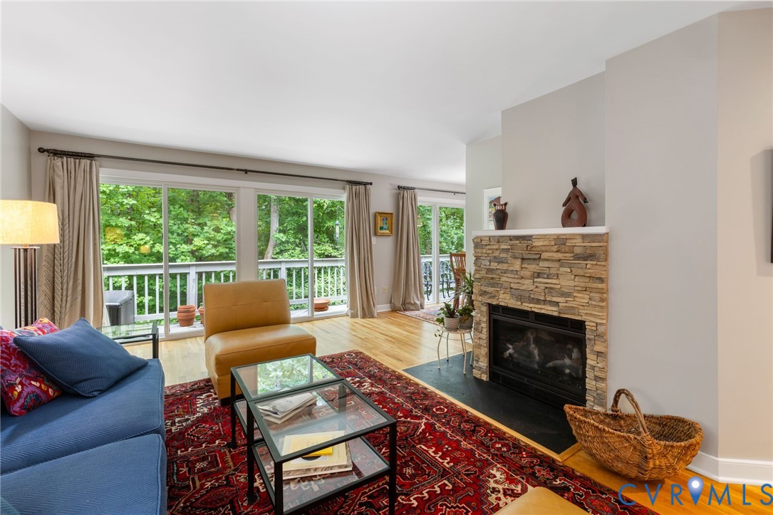 3111 Stony Point Road, Unit D Richmond, VA 23235 - Photo 14 of 32 Living area featuring wood-finish flooring and a s