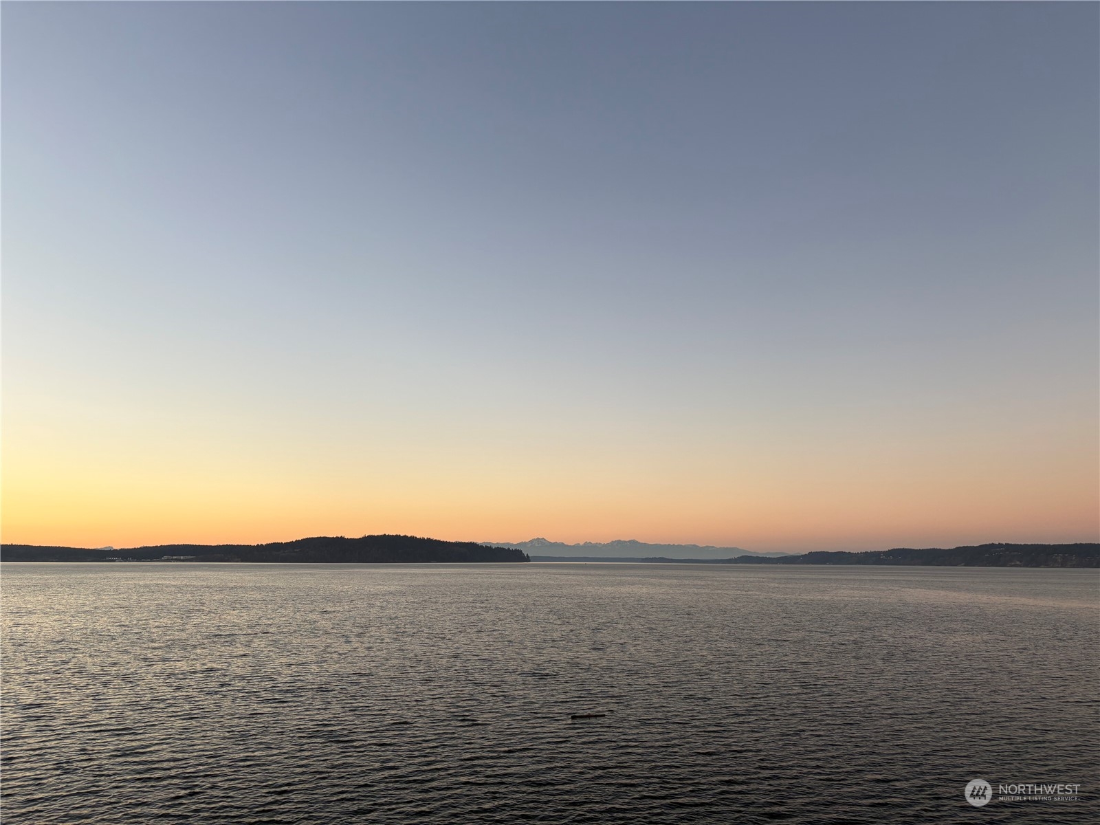 10111 Totem Way Anderson Island, WA 98303 - Photo 28 of 29 a view of lake and sunset