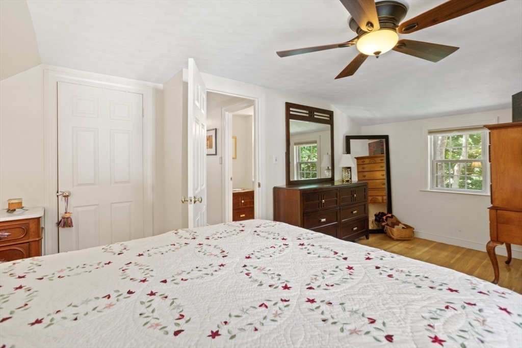 42 Sturges Road Reading, MA 01867 - Photo 20 of 42 a bedroom with a bed dresser and a window