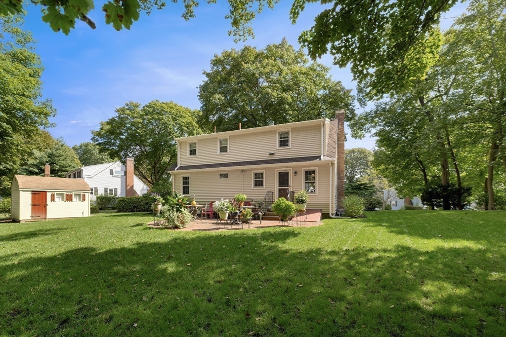 42 Sturges Road Reading, MA 01867 - Photo 4 of 42 a view of a house with a big yard