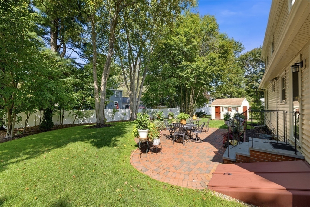 42 Sturges Road Reading, MA 01867 - Photo 6 of 42 a view of a backyard with sitting area