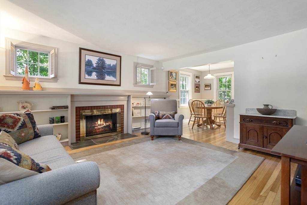 42 Sturges Road Reading, MA 01867 - Photo 8 of 42 a living room with furniture and a fireplace
