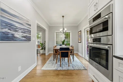 a kitchen with a counter space cabinets and appliances