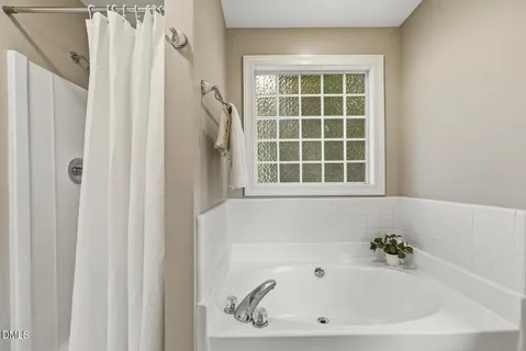 an empty room with closet area