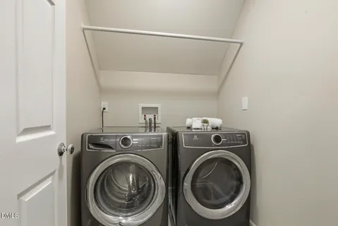 a view of a chairs and table on the wooden floor