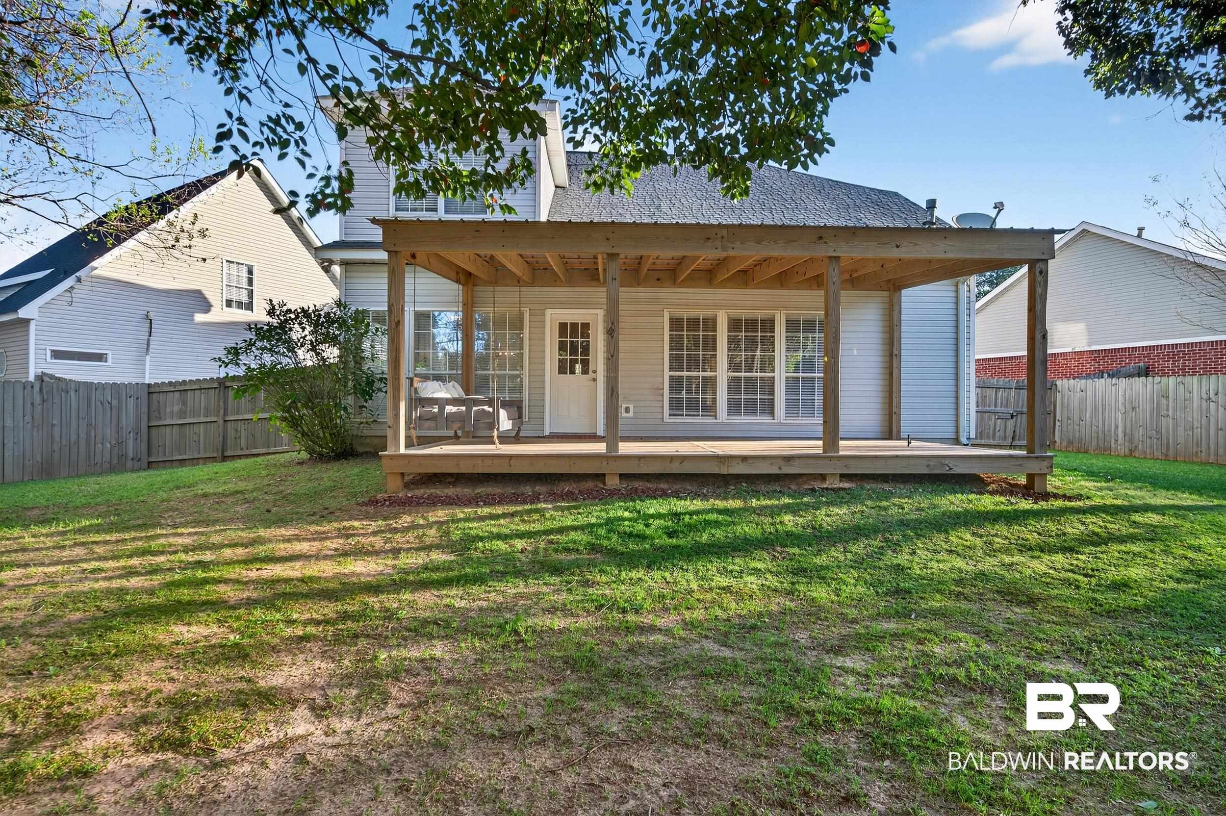 7050 Highpointe Place West Daphne, AL 36527 - Photo 41 of 66 Rear view of property featuring a fenced backyard
