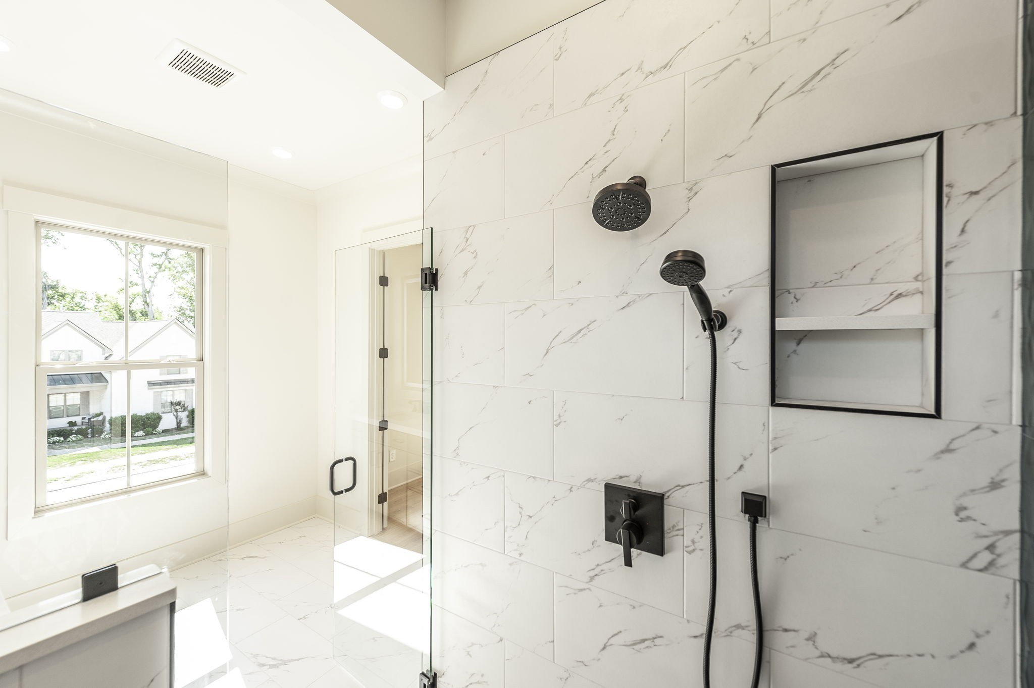 339 Raintree Drive Hendersonville, TN 37075 - Photo 15 of 53 a bathroom with a tub and a shower