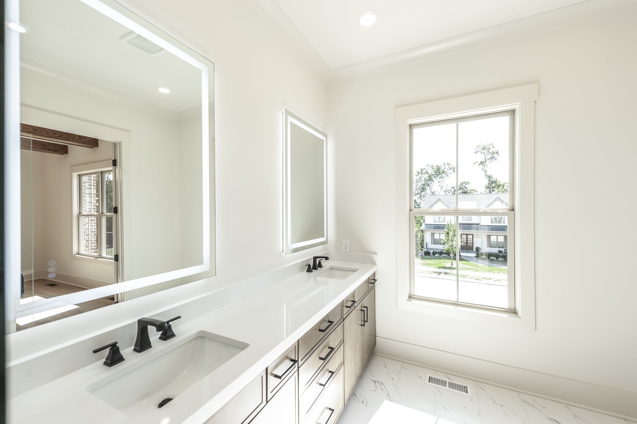 339 Raintree Drive Hendersonville, TN 37075 - Photo 16 of 53 a bathroom with double vanity and a window