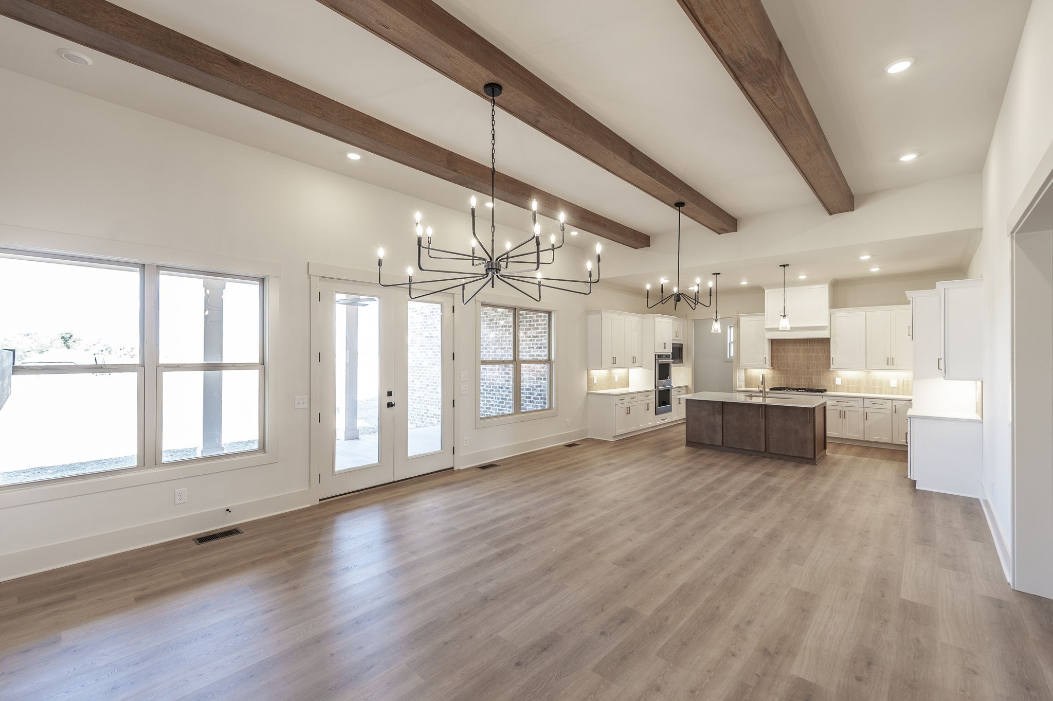 339 Raintree Drive Hendersonville, TN 37075 - Photo 25 of 53 a large white kitchen with large windows and white walls